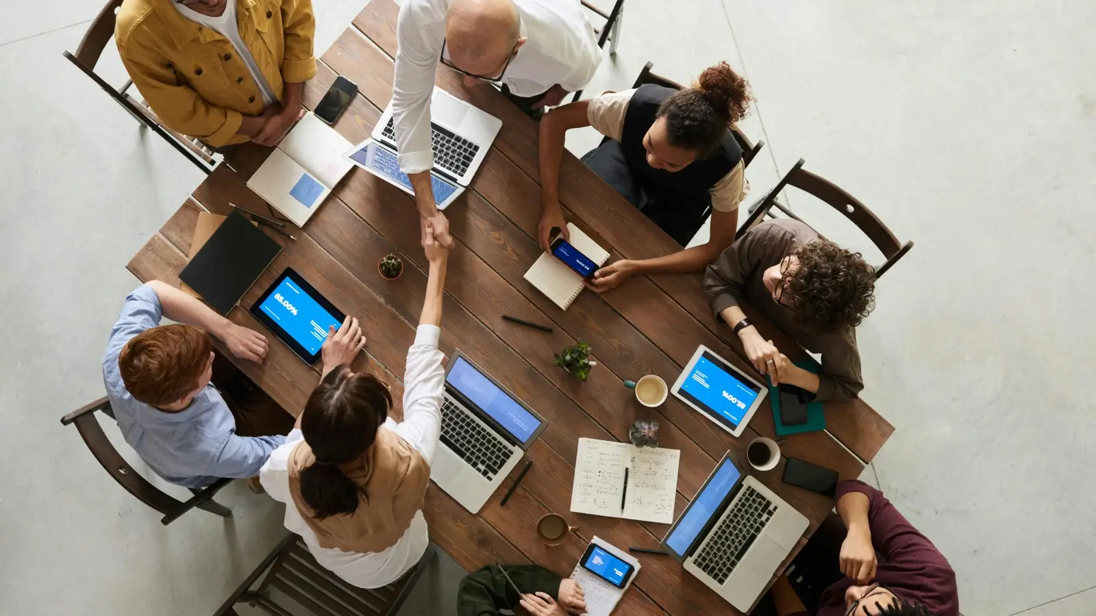 How Risk-Aware Leadership Translates Into Market Trust Business leader reviewing cybersecurity and governance strategy with board members