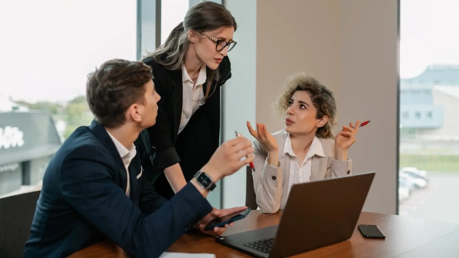 Unblocking B2B Sales: Building Efficiency for Lasting Growth Business team reviewing automated B2B sales processes on a digital dashboard