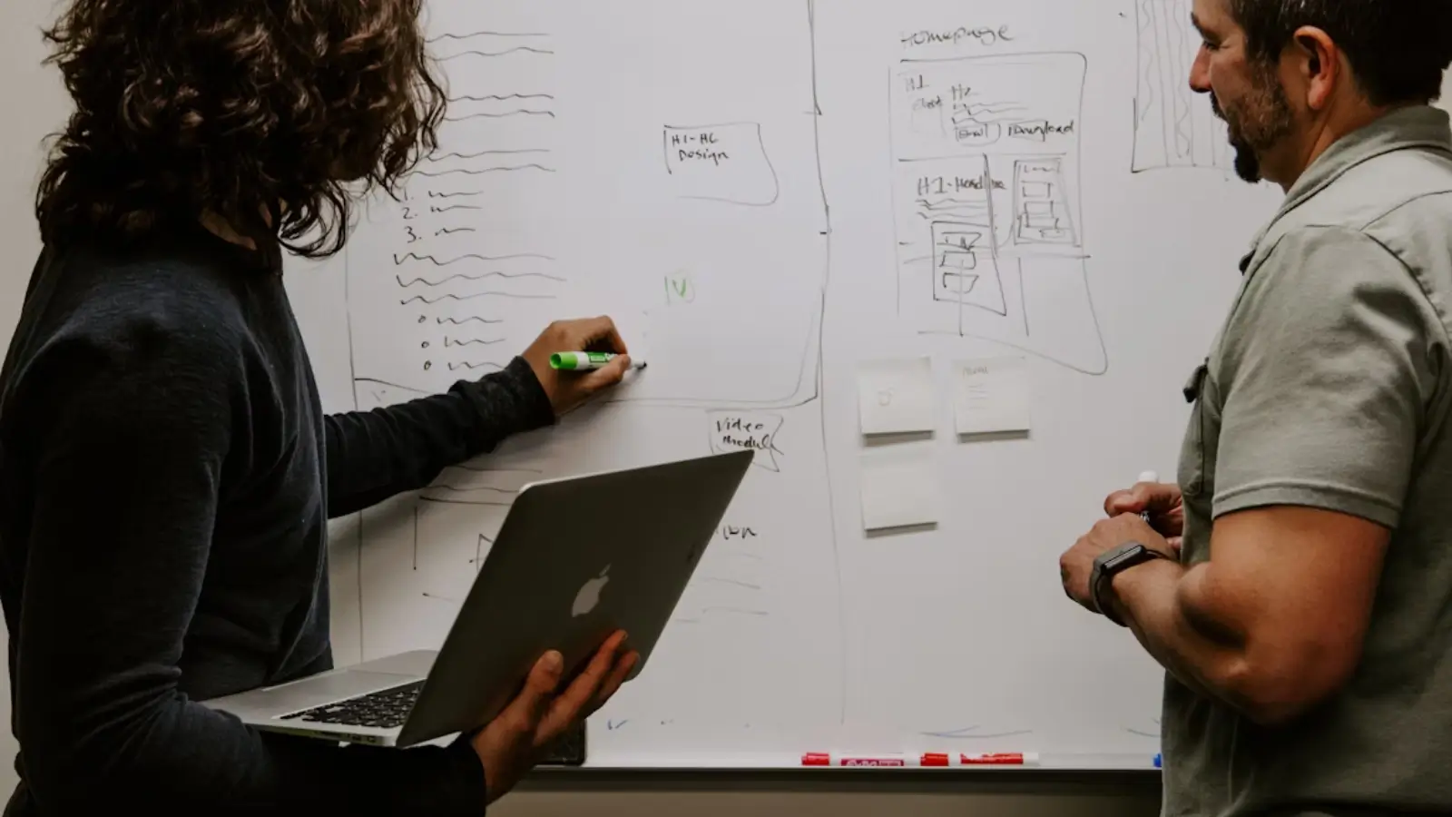 3 Strategies to Keep Business Operations Running During Disasters Business team reviewing disaster recovery plan after power outage in office