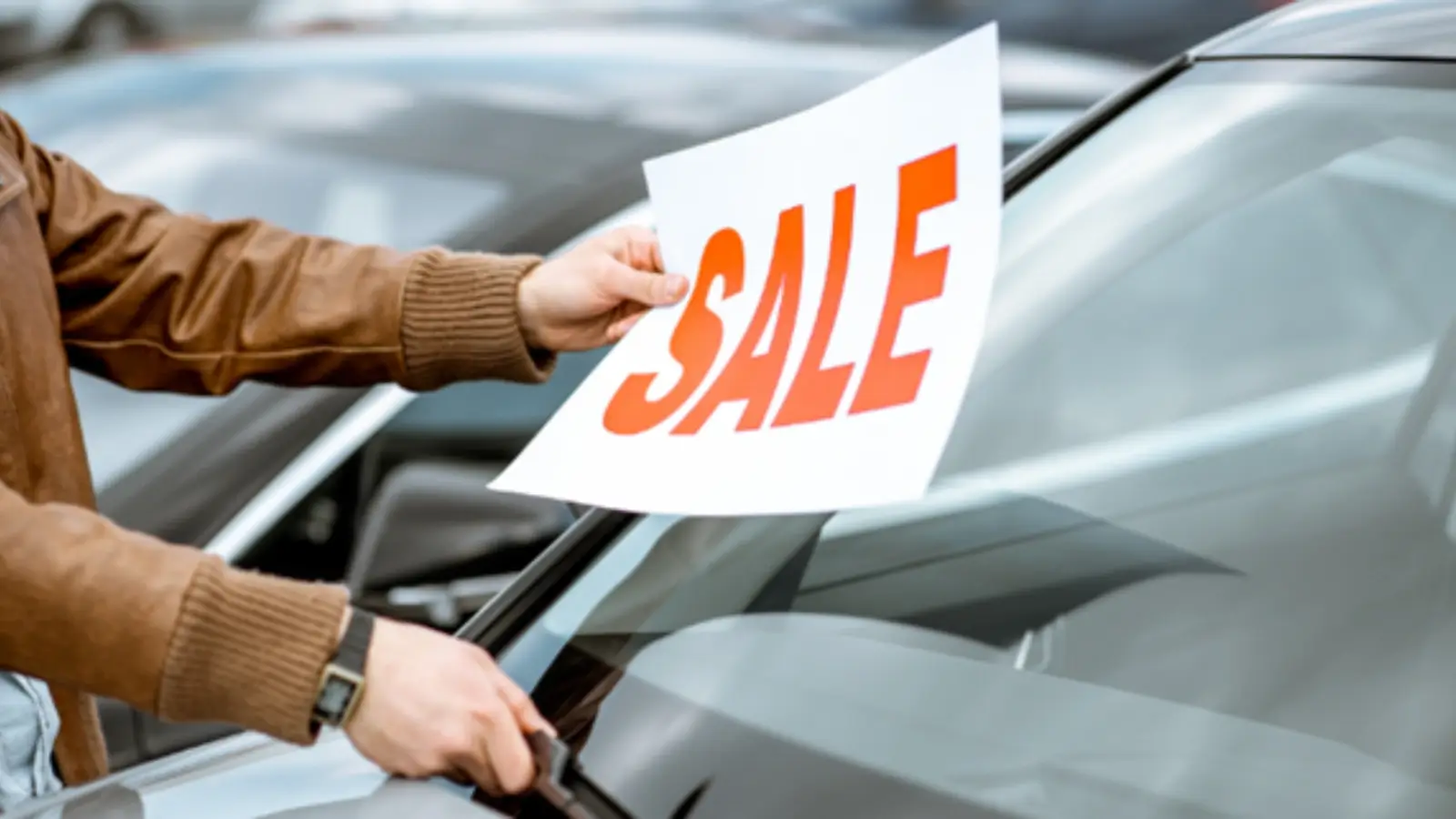 Car buyer using virtual showroom and AR tools for vehicle selection in 2025