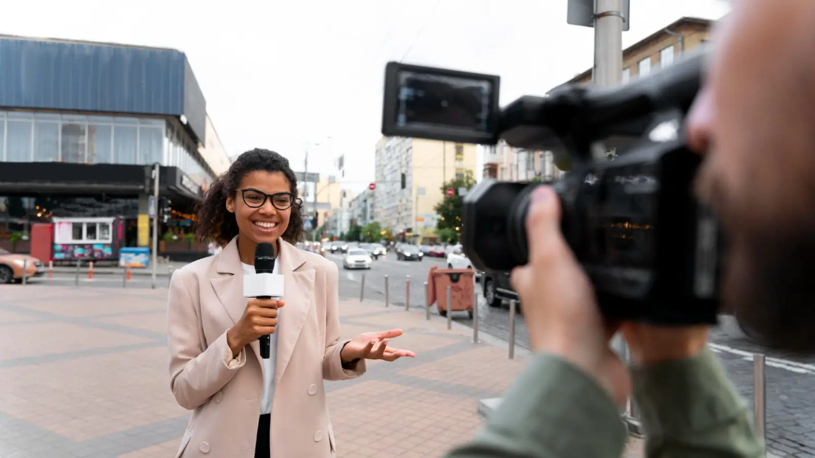 Citizen journalist recording local news on a smartphone in Africa
