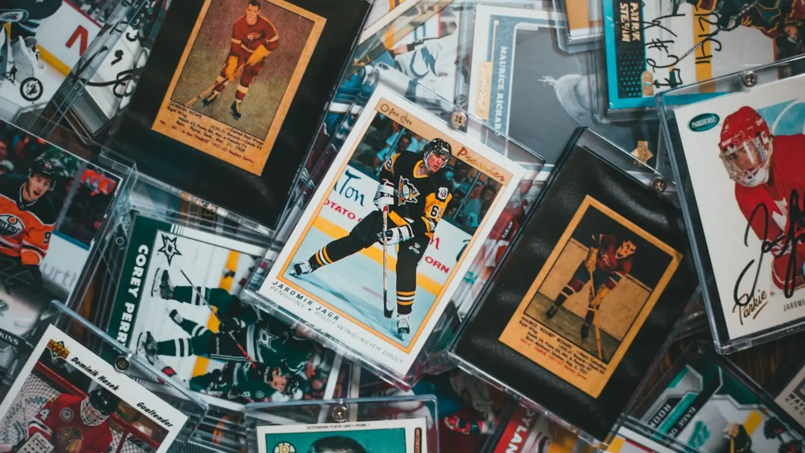 Understanding the Value Behind Collectibles: Where Passion Meets Provenance Close-up of rare collectibles including vintage trading cards and autographed memorabilia