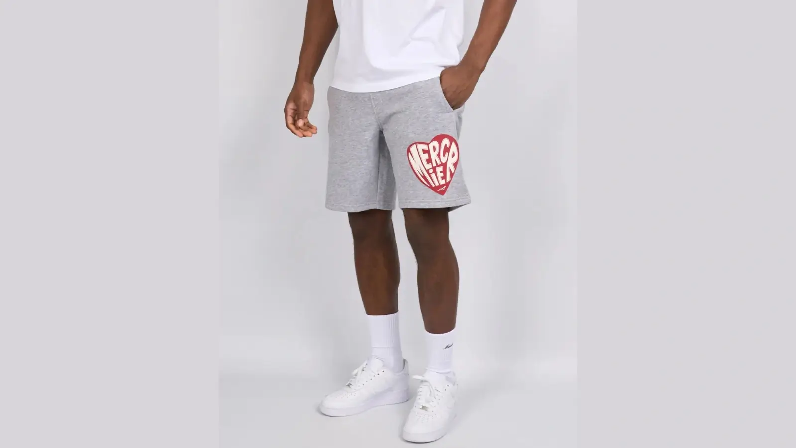 Cole Buxton streetwear collection featuring T-shirt, hoodie, and joggers in a minimalist style