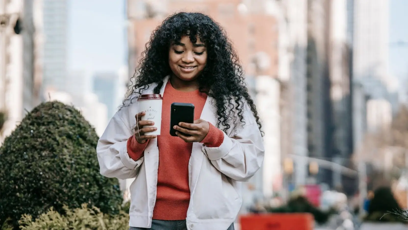 Customer using a loyalty app on smartphone to redeem rewards