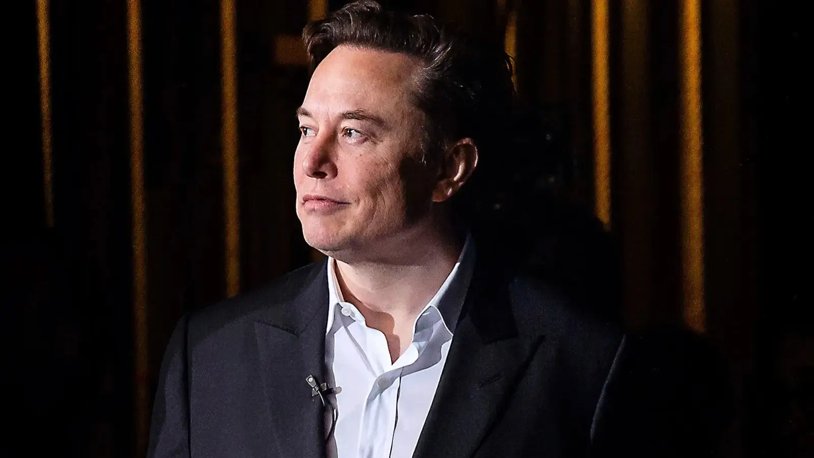 Elon Musk’s $1 Trillion Tesla Pay Clash: Will he Exit Tesla? Elon Musk at Tesla boardroom amid leadership and pay deal controversy