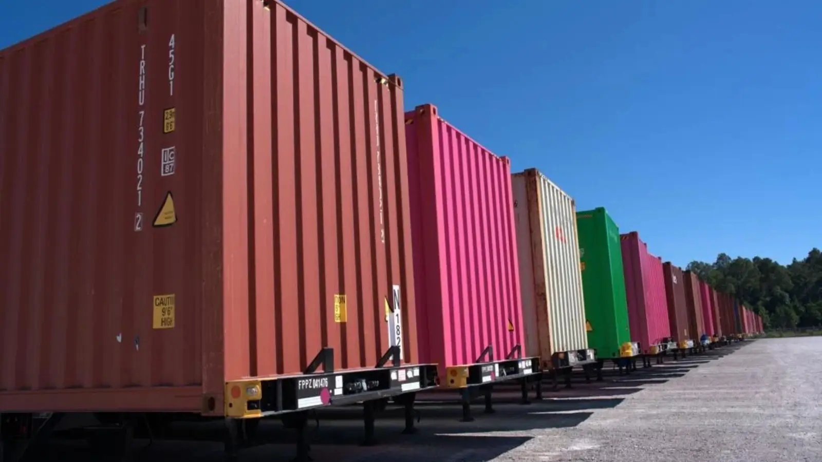 Freight trucks and trains moving through Indiana’s logistics network