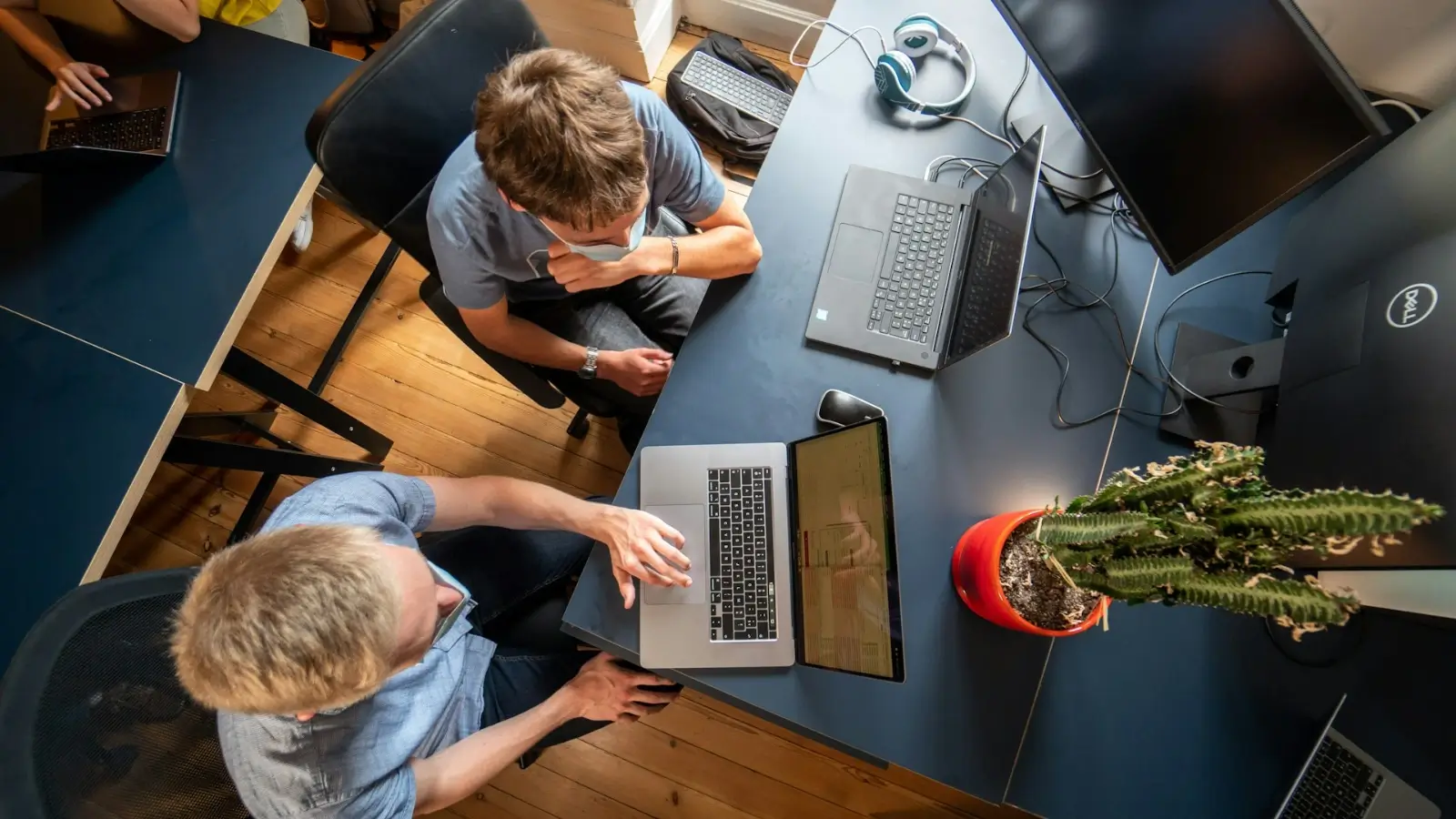 Global business outsourcing team collaborating with technology and virtual tools