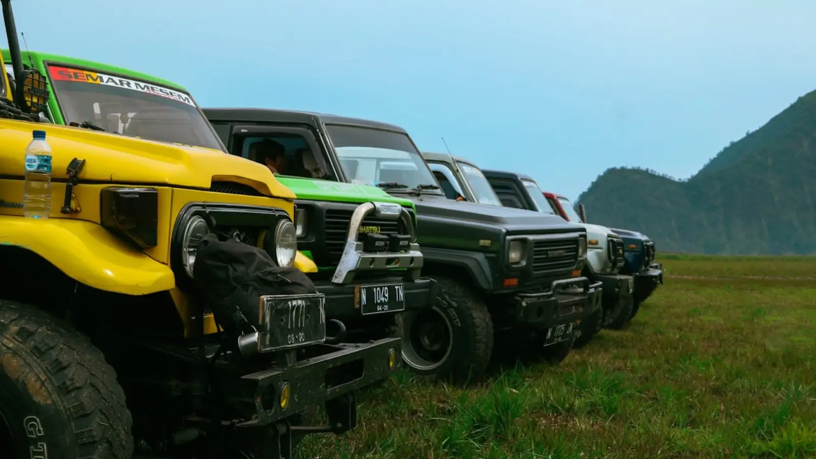 5 New Cars for Off-Road Enthusiasts Lineup of top off-road vehicles including Jeep Wrangler, Ford Bronco, and Toyota 4Runner on rugged terrain