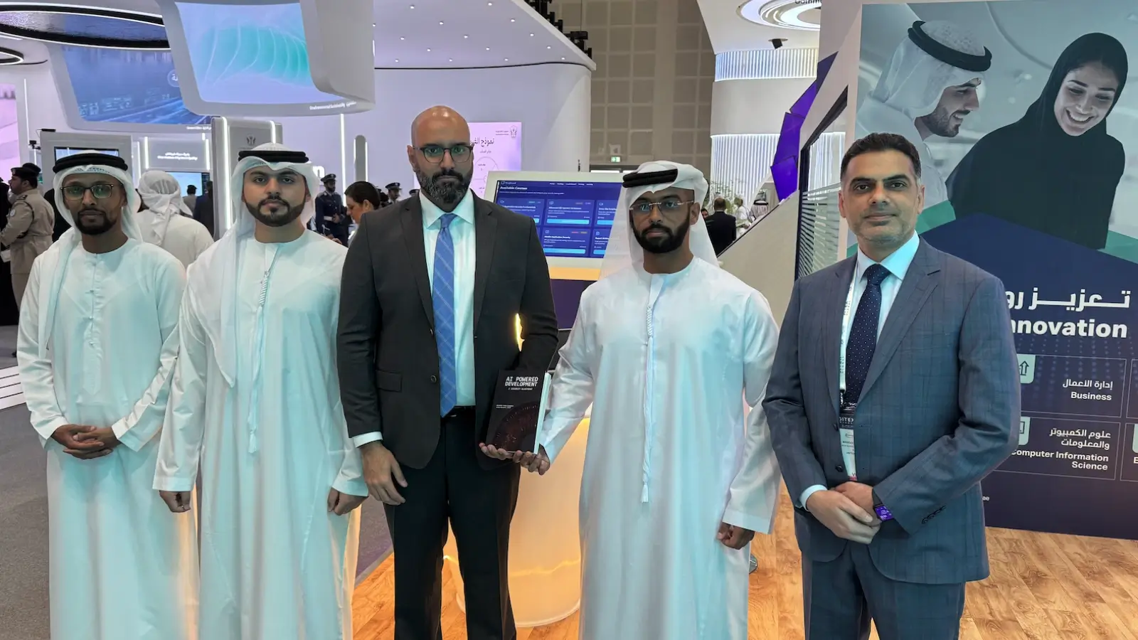 Mansoor Ahmad Khan launching AI Security Blueprint book at GITEX Global 2025 in Dubai