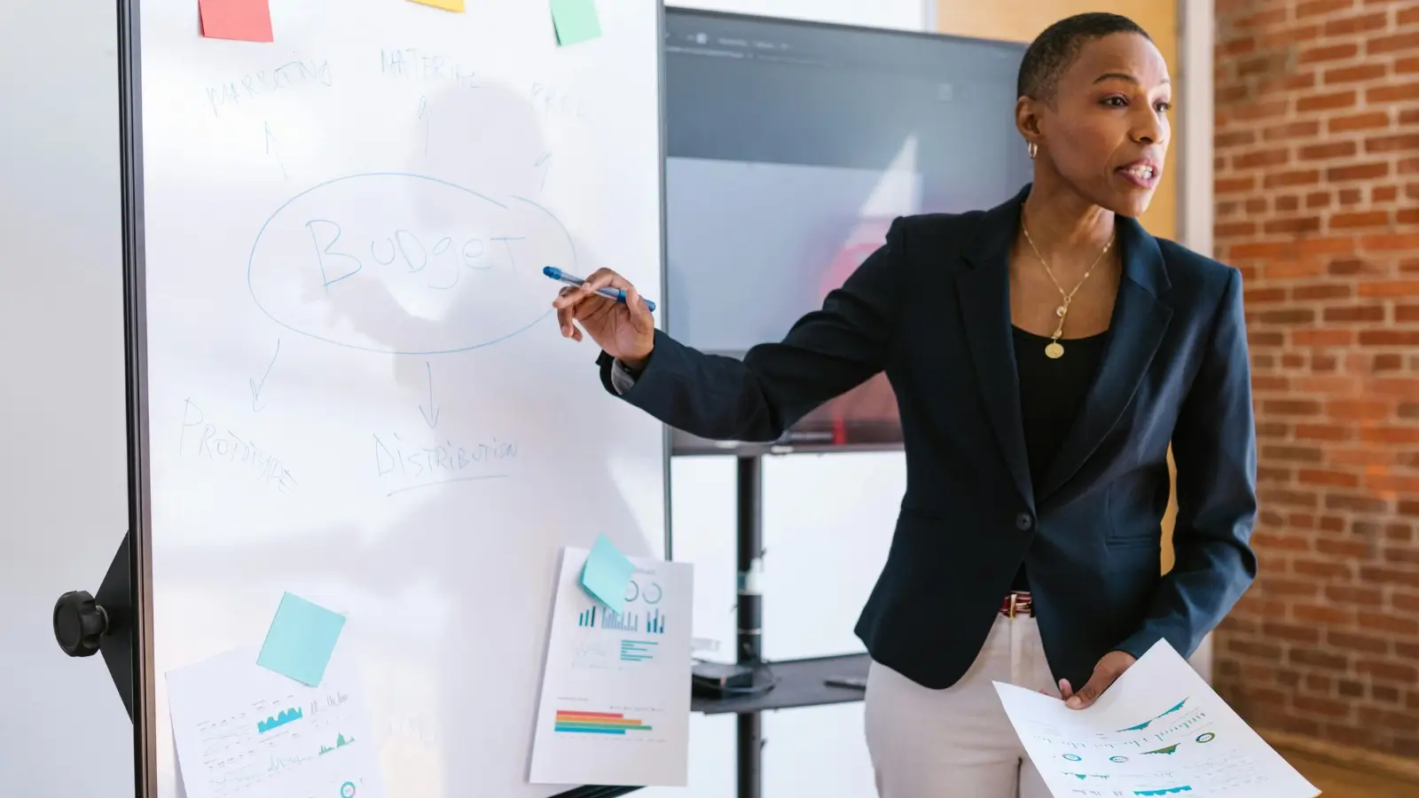 Office relocation team setting up desks and IT infrastructure in a modern startup space