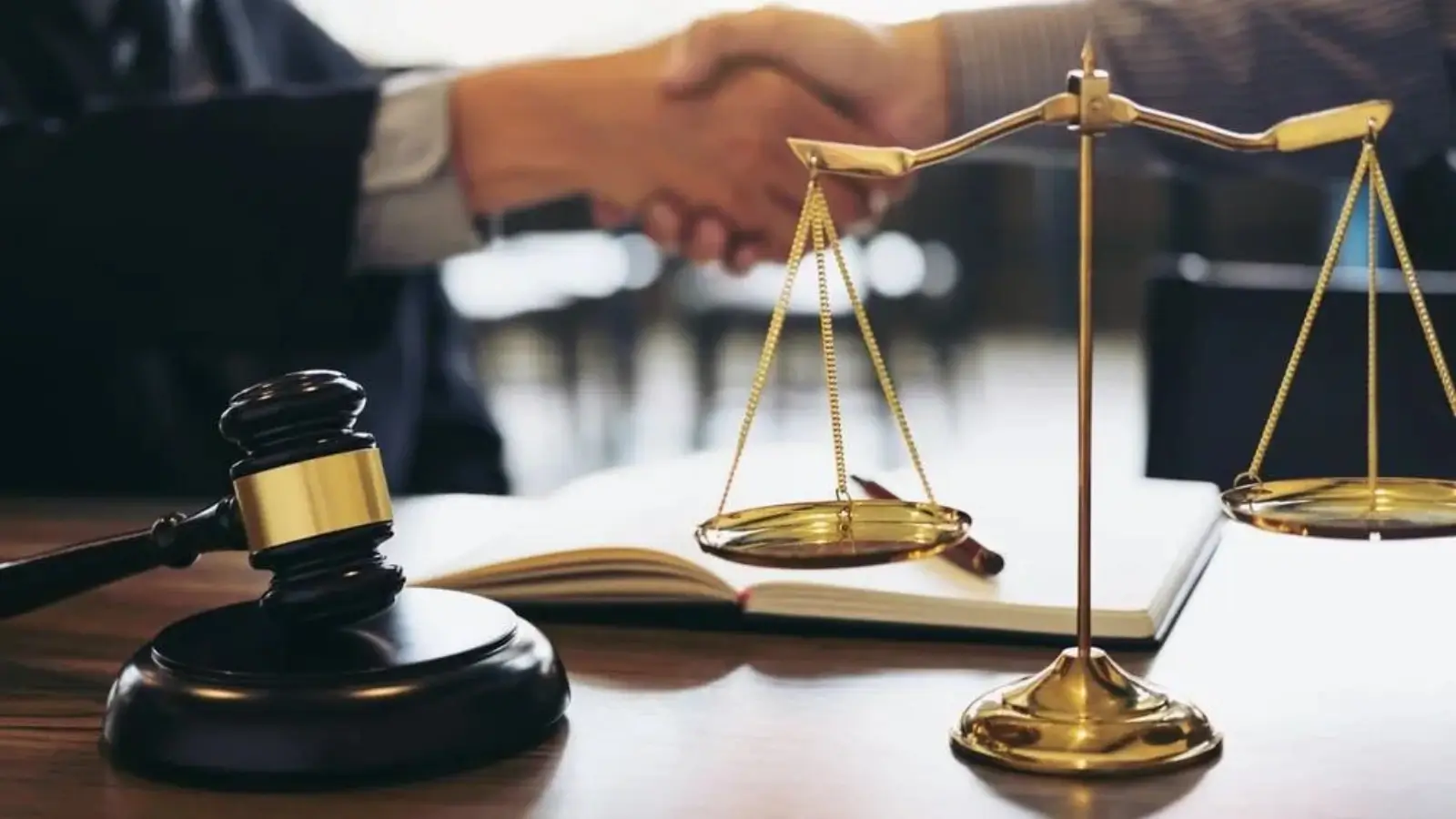 Personal injury attorney in Queens meeting with a Ridgewood client to discuss accident case