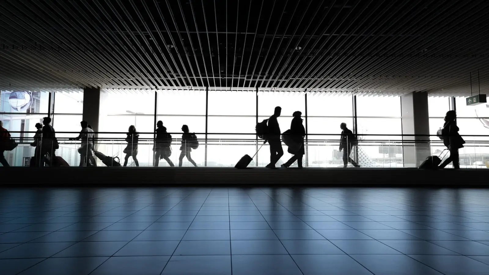 Top Challenges Professionals Face When Relocating Abroad and How to Overcome Them Professional traveler reviewing relocation plans and passport documents before moving abroad