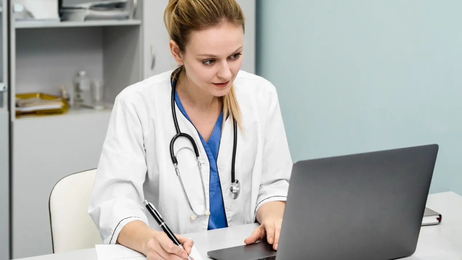 Remote healthcare worker completing online BLS certification on a laptop