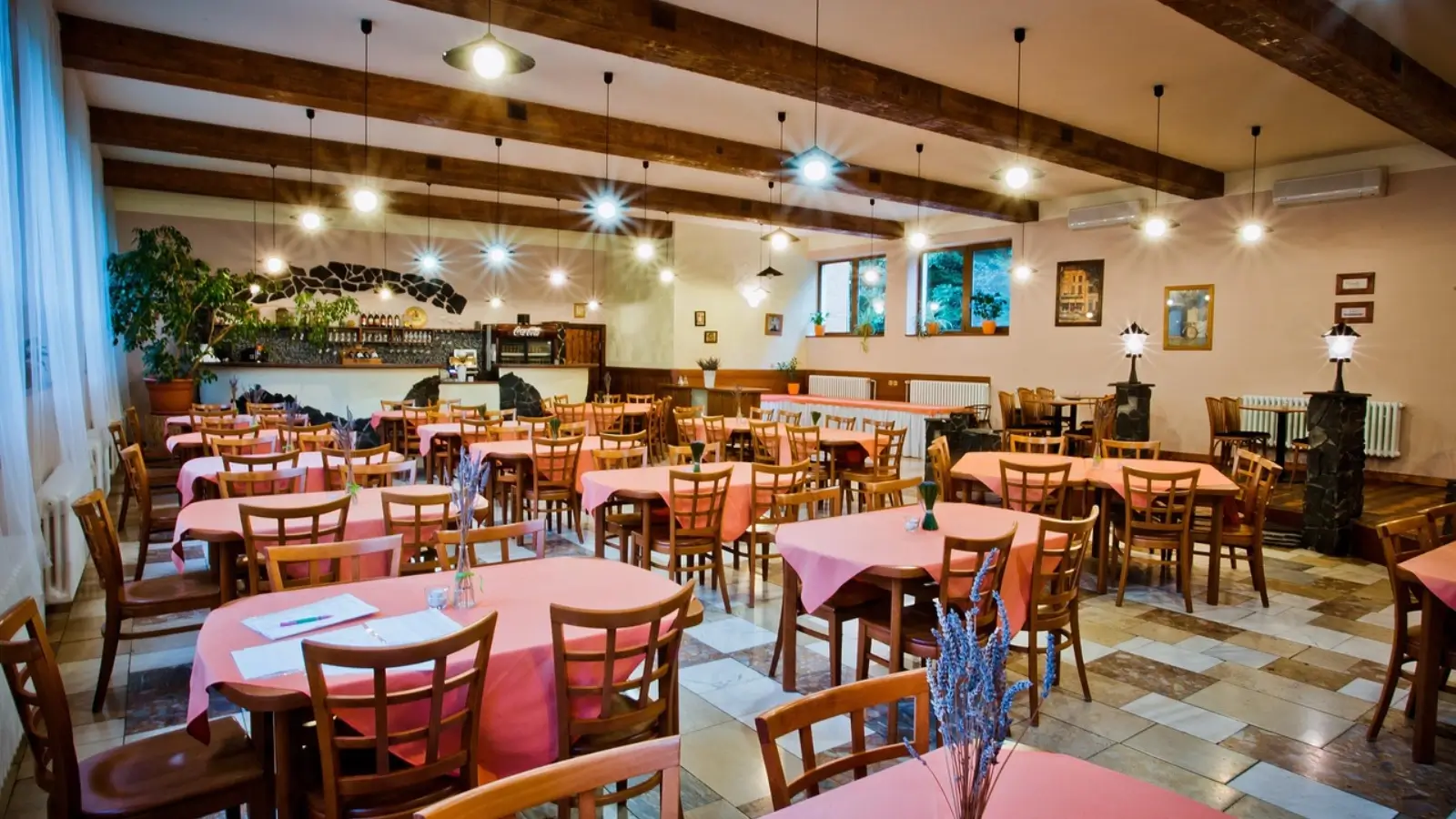 Food For Thought: How To Keep Your Restaurant Financially Healthy Restaurant owner reviewing finances and kitchen equipment for business growth