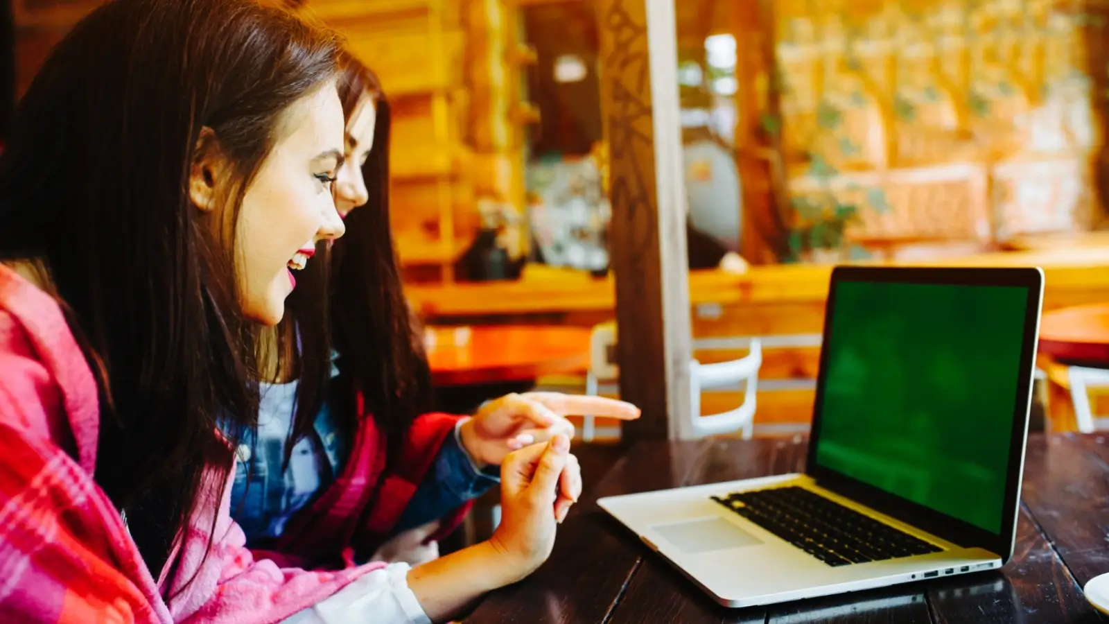 Seller listing concert tickets online using a resale platform on laptop