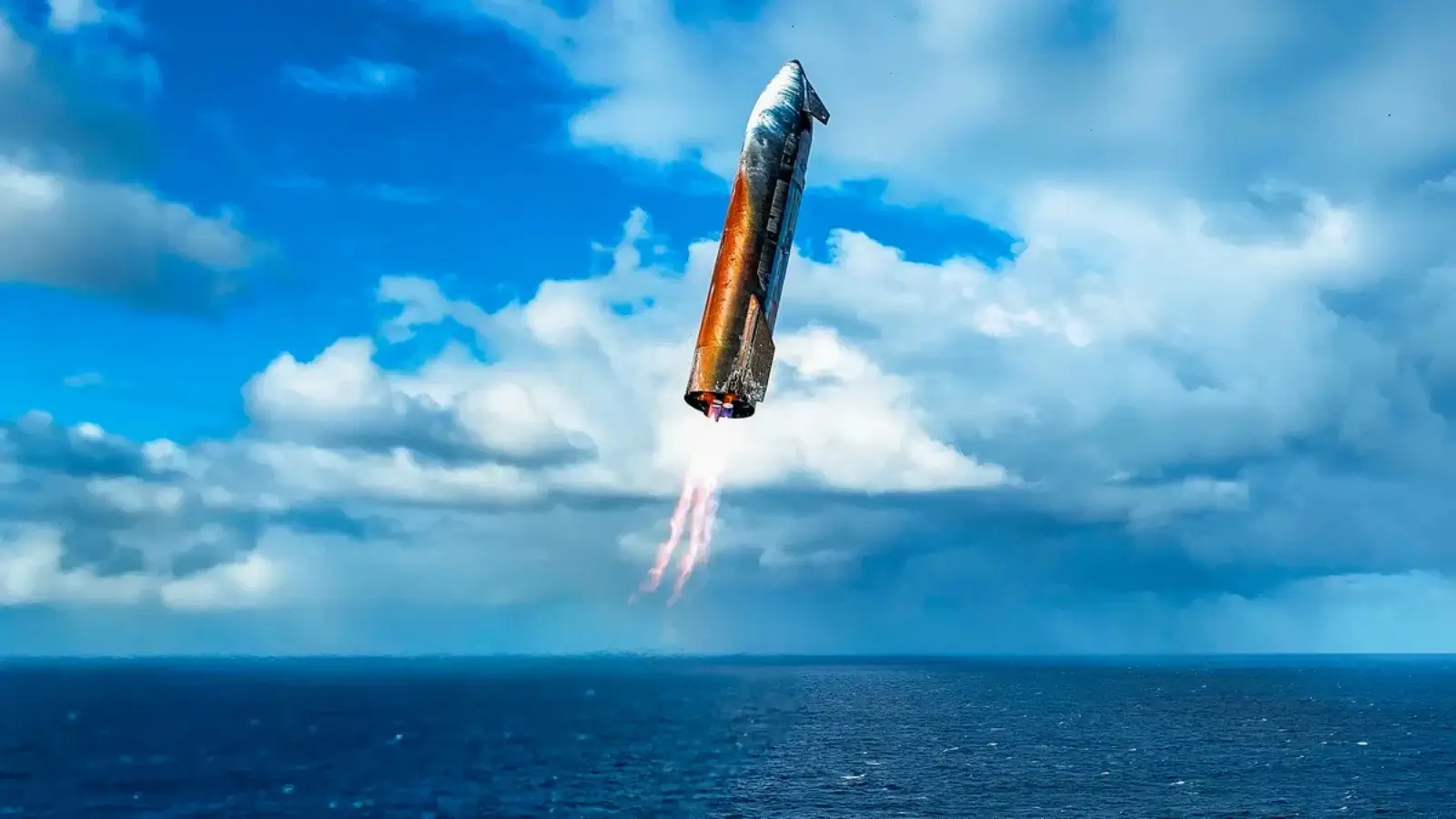 SpaceX Starship descending in flames over the Indian Ocean during controlled reentry