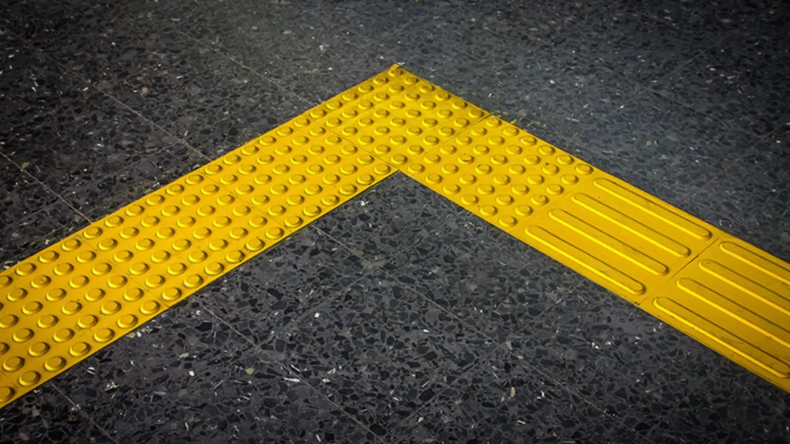 Tactile ground surface indicators at a pedestrian crossing in an Australian city