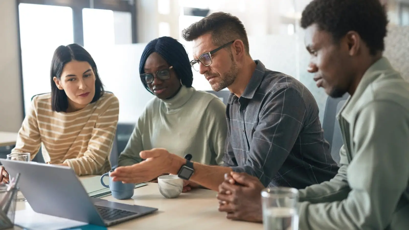 Branding Blind Spots: The Overlooked Threat to Brand Strength Team analyzing brand alignment strategy to identify blind spots in messaging