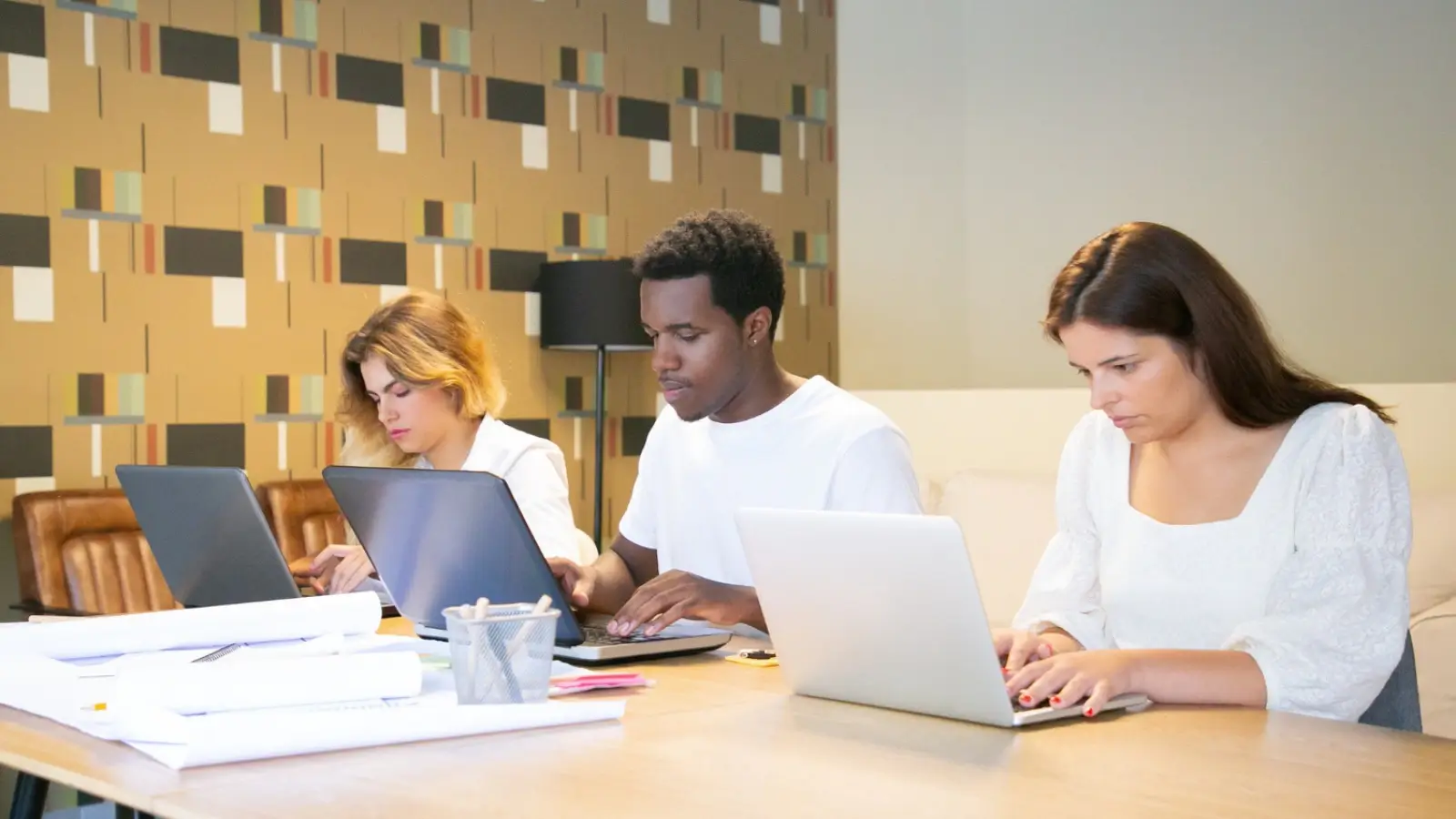 Essential Strategies for Efficient Document Workflows in Modern Organizations Team collaborating on digital document workflow software across desktop and mobile devices