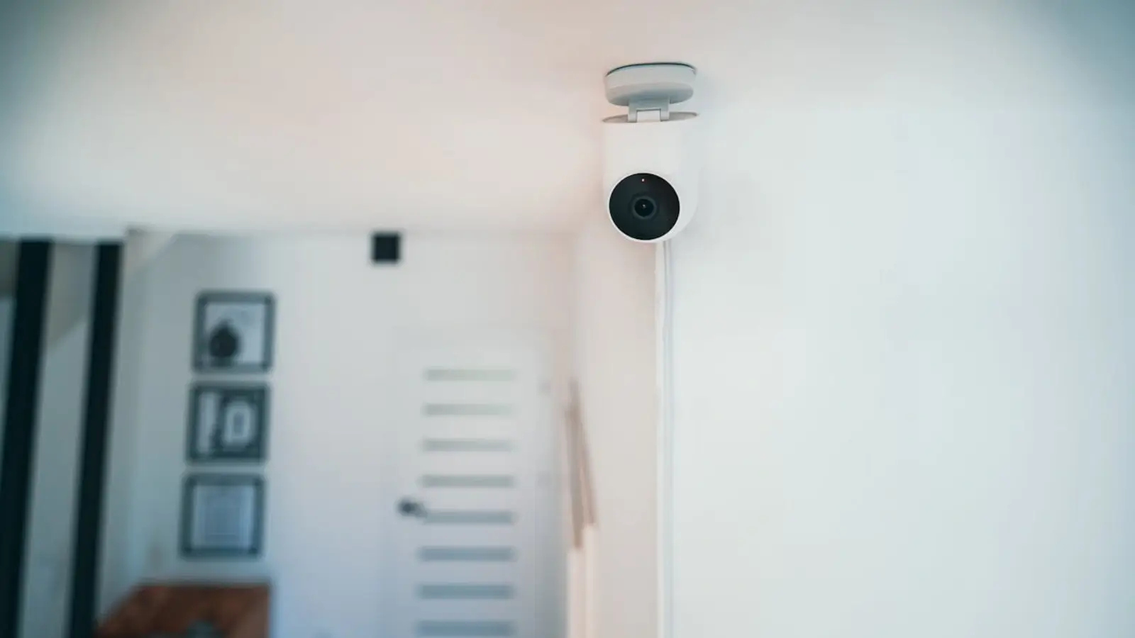 Reliable CCTV Install for Homes & Businesses Technician installing a CCTV security camera on a home exterior wall