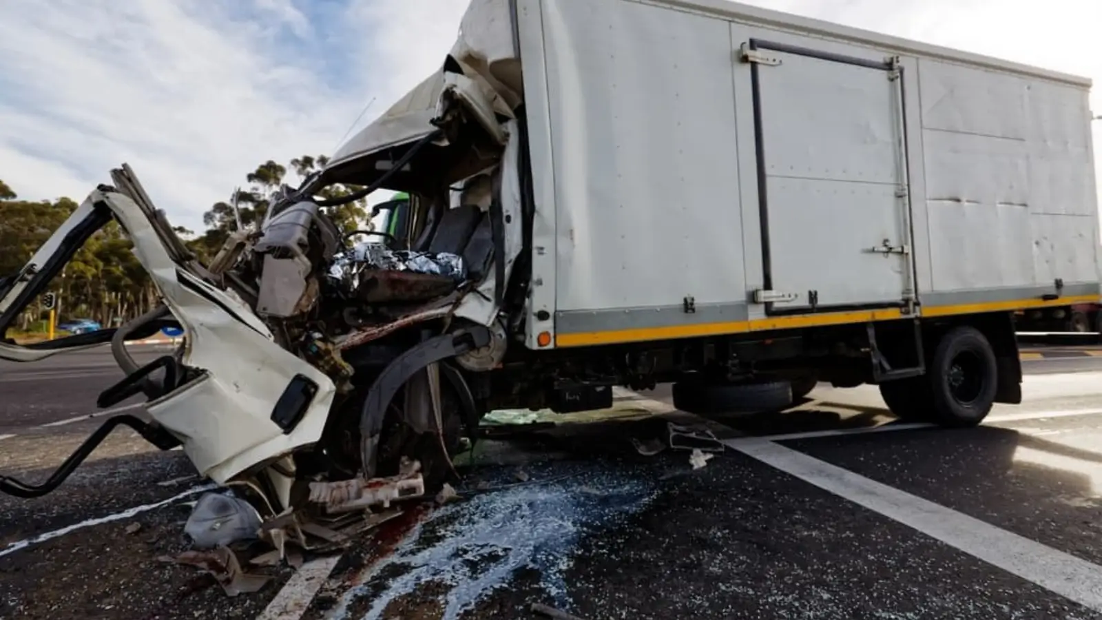 An Anderson Personal Injury Lawyer Explains the First Steps to Take After a Truck Accident Truck accident aftermath with damaged vehicles and legal documentation process