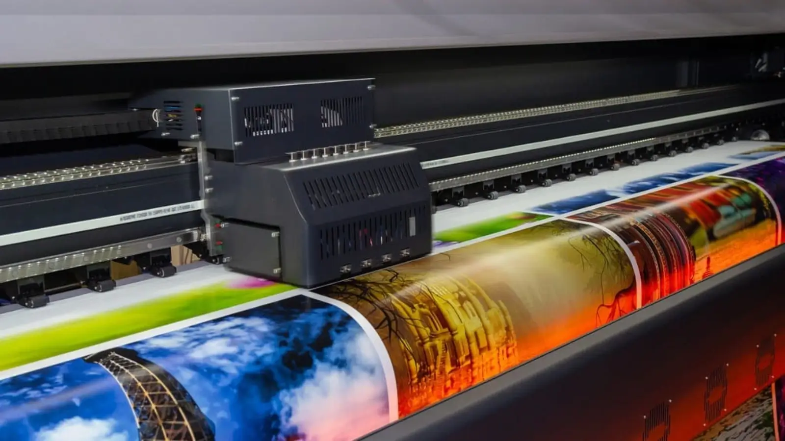 6 Best Same-Day Vinyl Printers Across the UK Urgent same-day vinyl banner printing in progress at a UK print shop with a delivery van outside