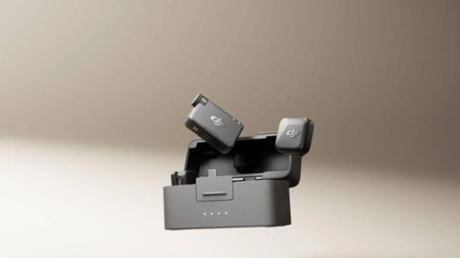 Why Every Vlogger Needs a Wireless Lavalier Microphone for Their Vlog Camera Setup Vlogger clipping a wireless lavalier microphone onto their shirt before recording