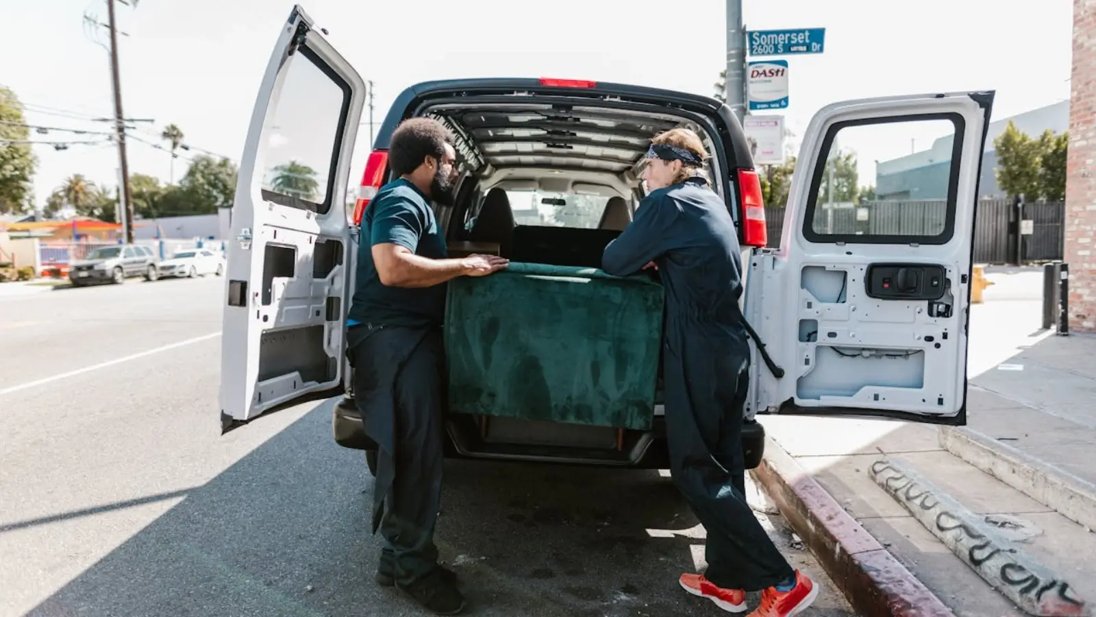 White glove delivery professionals handling delicate machinery for an Australian business