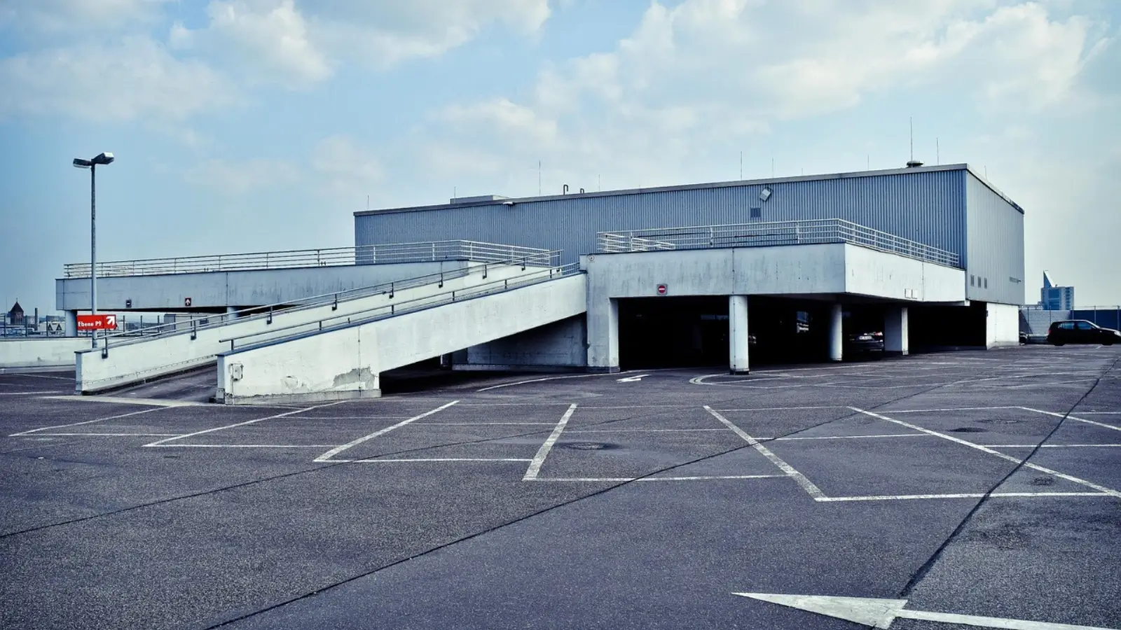 Why Wilson Parking Remains A Top Choice For Australian Drivers Wilson Parking facility with digital signage and parked cars in an Australian city