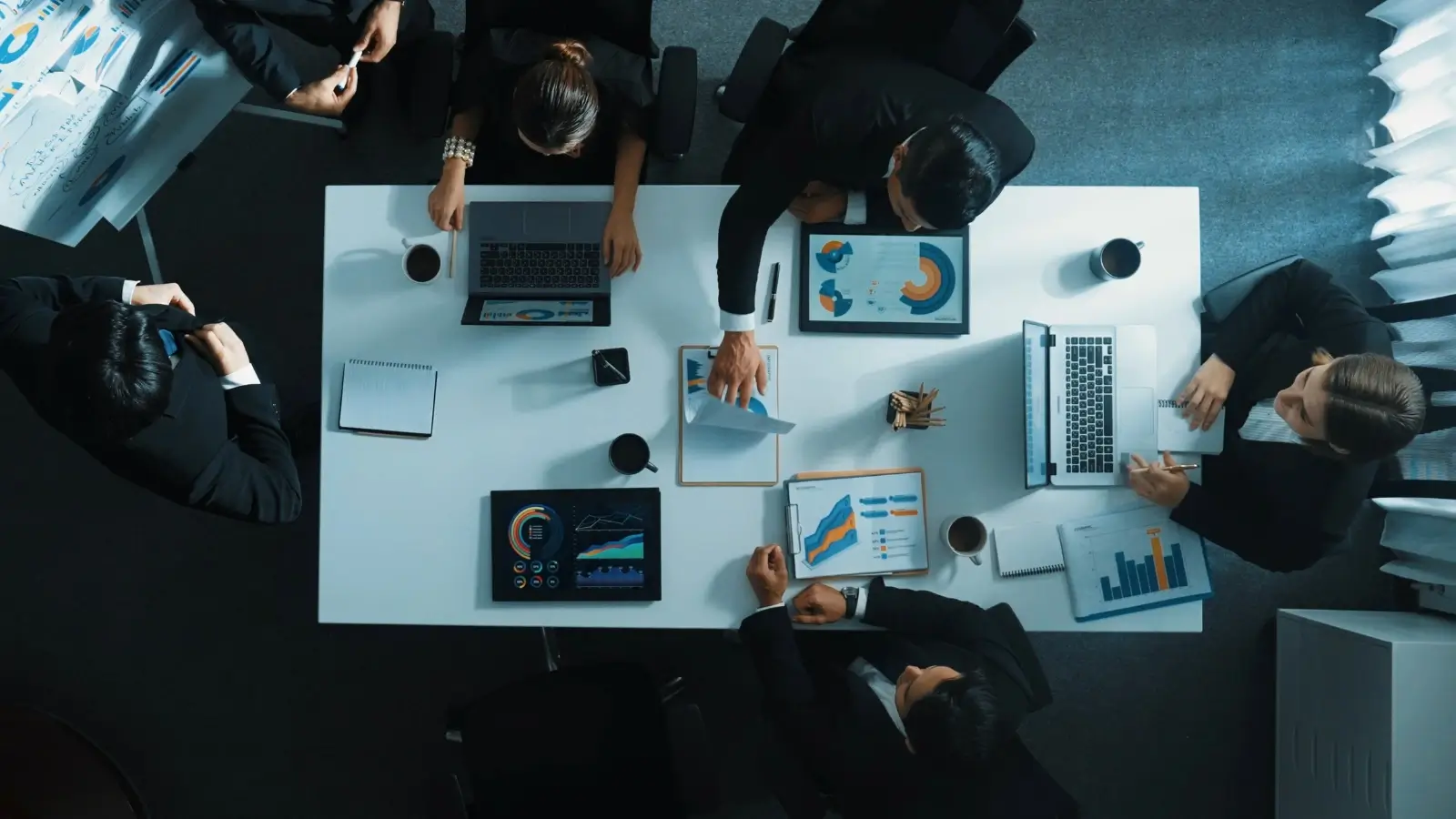 Adelaide business owner reviewing financial strategy and investment plans at a desk