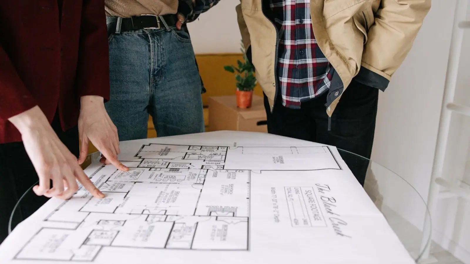 Australian home under construction with builder and homeowner discussing plans