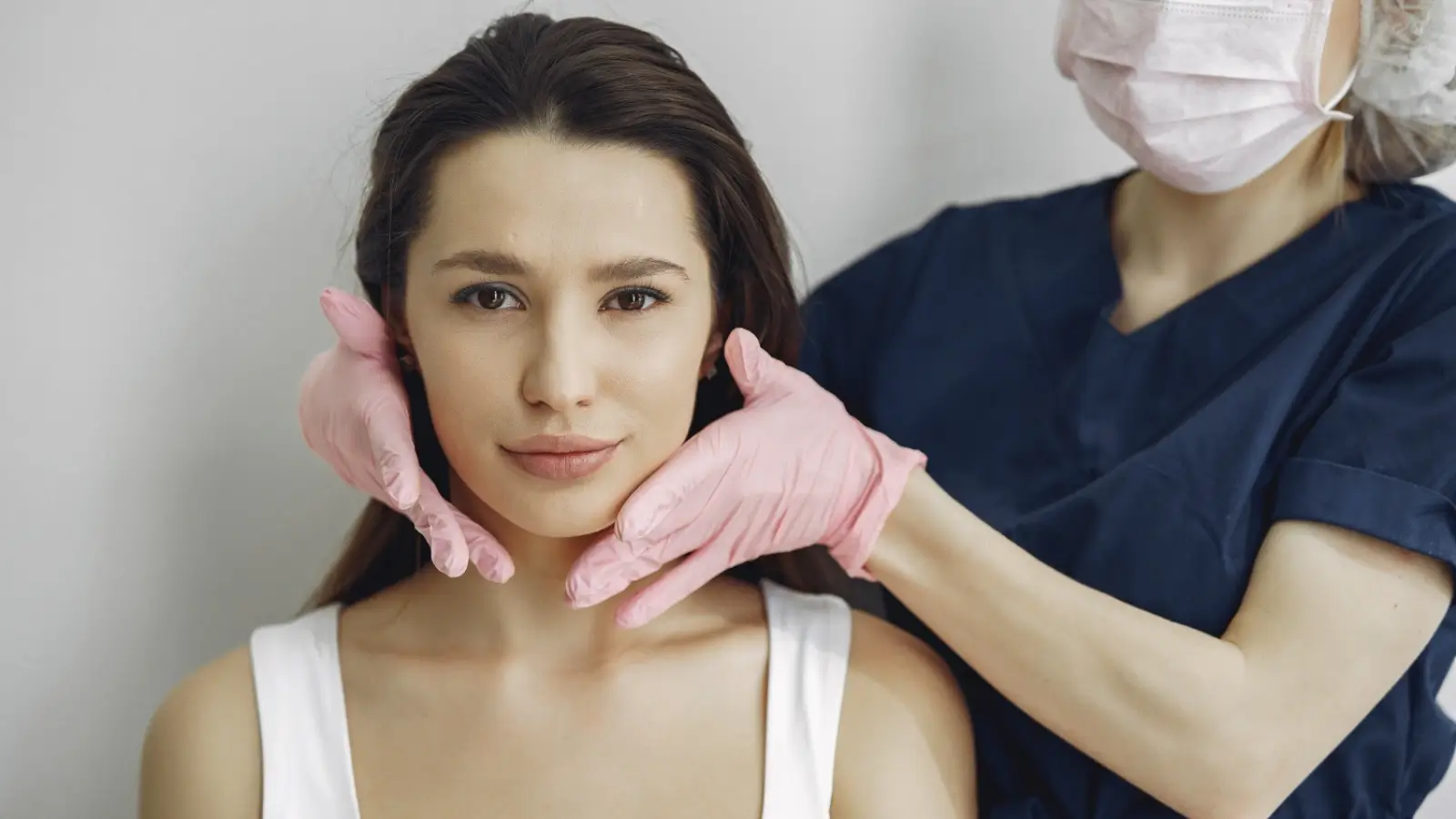 Before and after comparison of V-line jaw contouring surgery on a young woman’s face