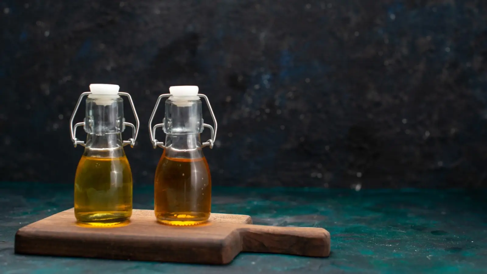 Bulk soybean oil containers in a commercial kitchen setup