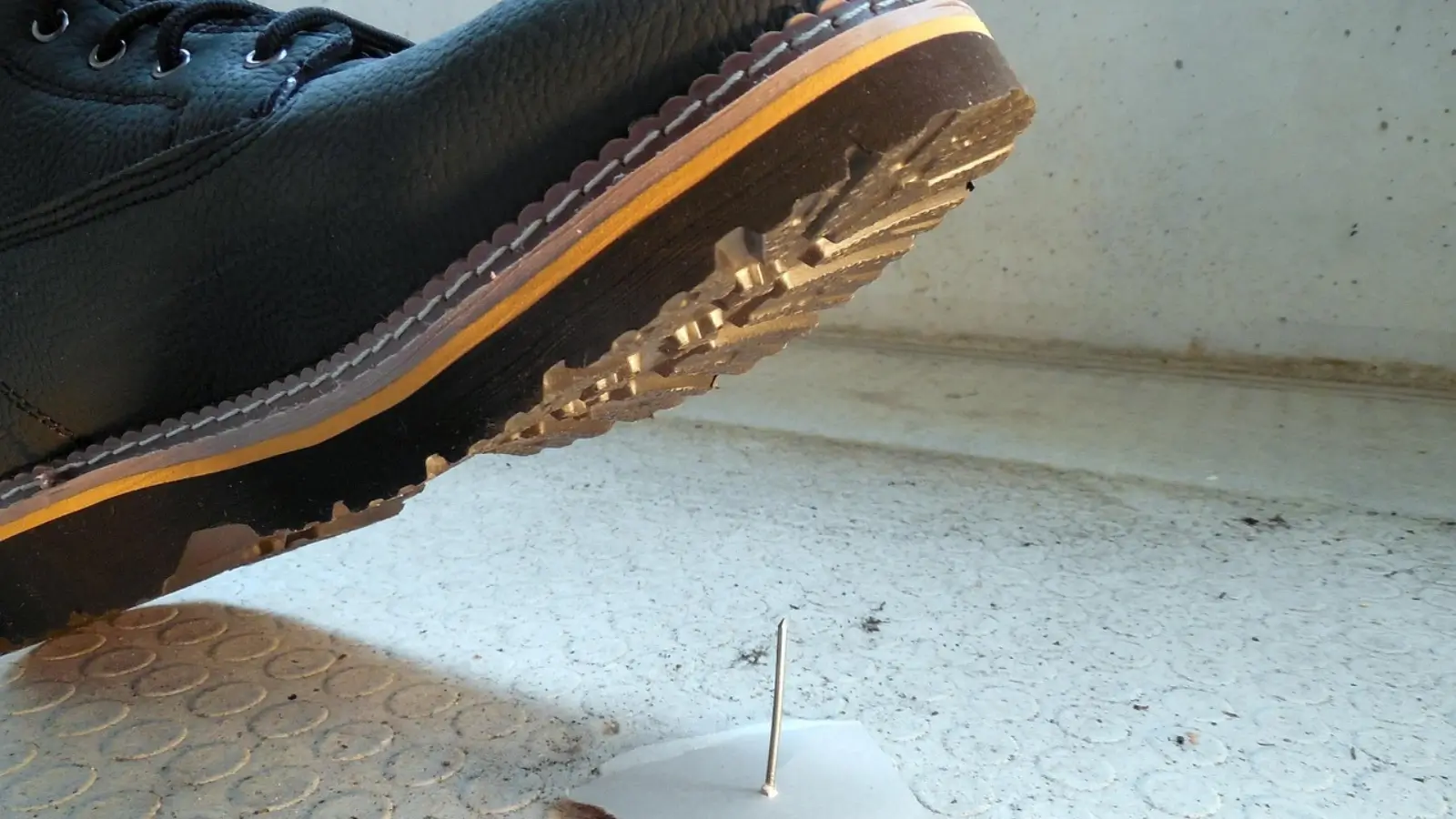 Business owner implementing workplace safety protocols with team