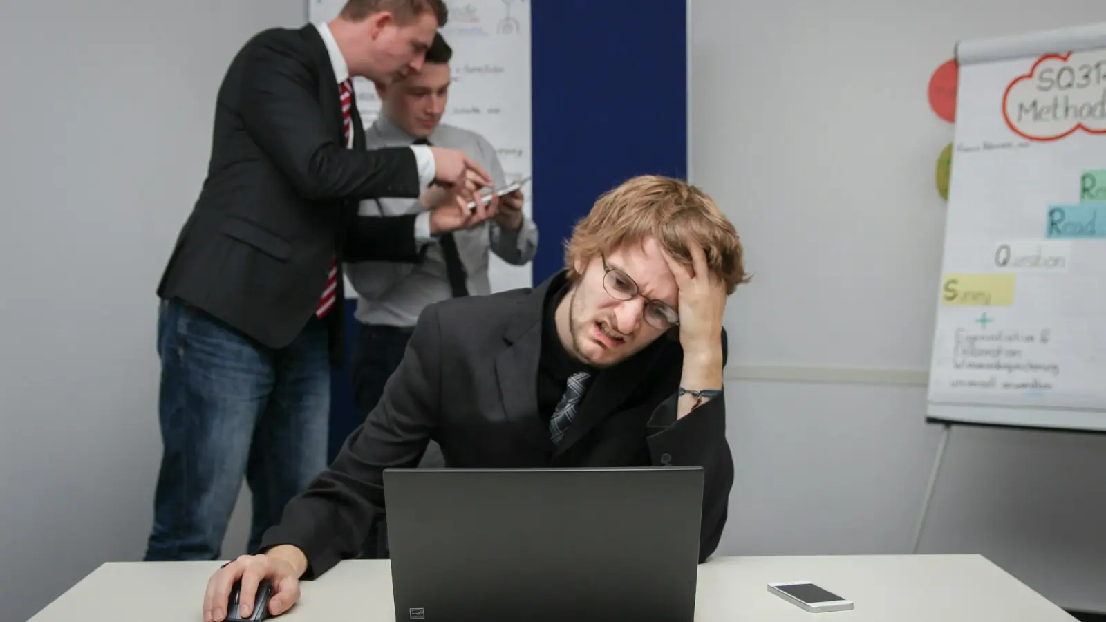 Business owner reviewing workplace safety report after an on-site incident