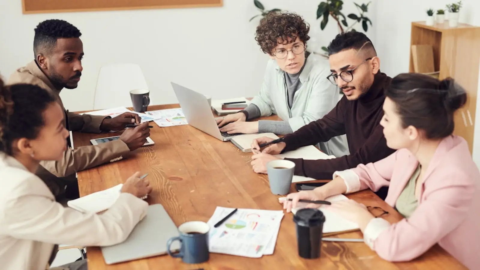 Business team analyzing funnel insights to improve customer retention strategy