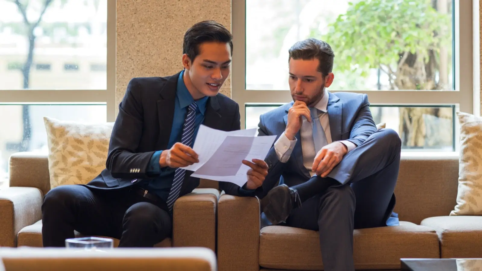 Calgary property manager reviewing lease agreement with real estate investor