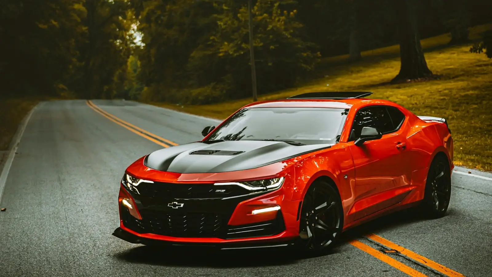 Chevrolet SUV with roof rack, floor mats, and custom interior accessories