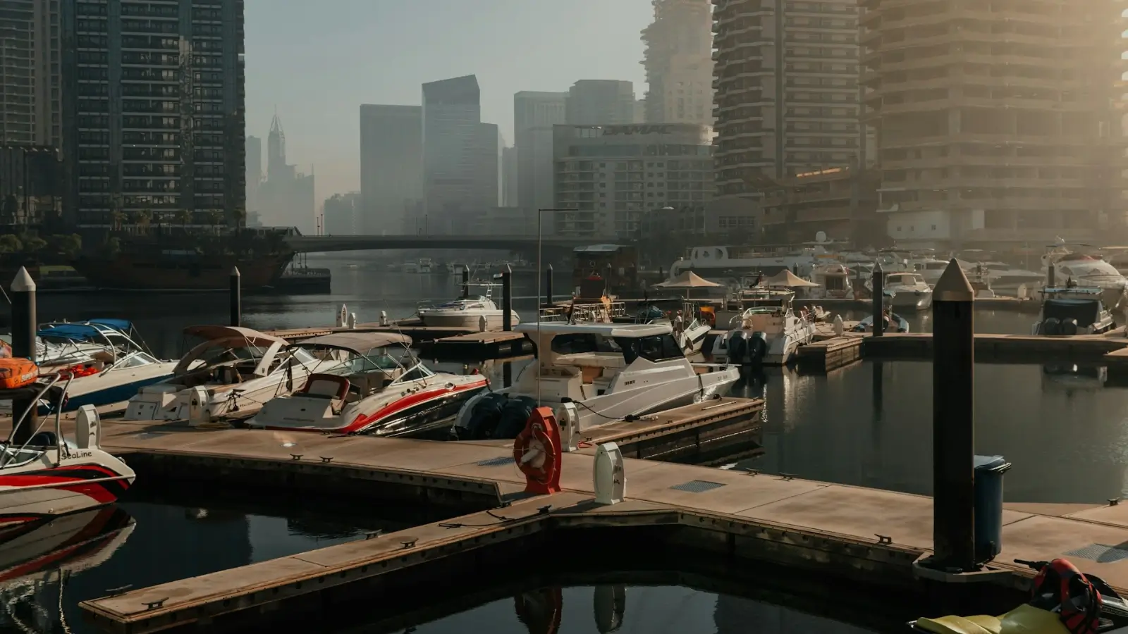 Engineered floating dock system installed at a modern marina with boats moored alongside
