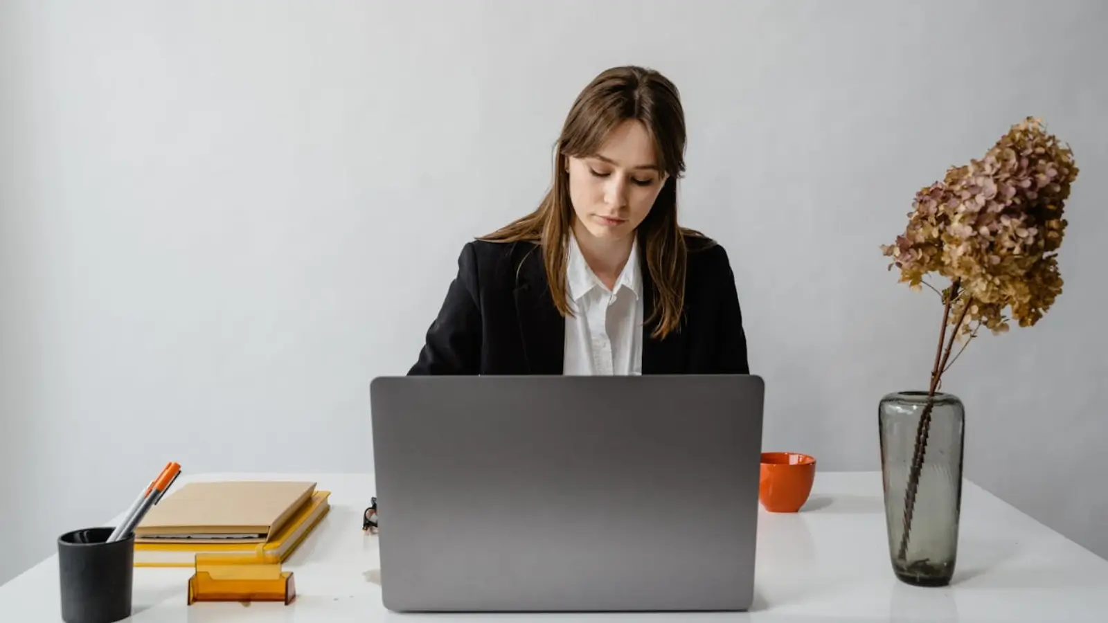 Entrepreneur setting up small business tools and planning essentials for 2025