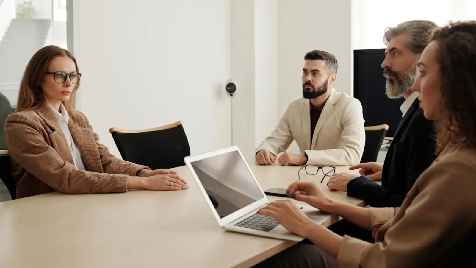 IT professionals collaborating in a modern office environment through staff augmentation