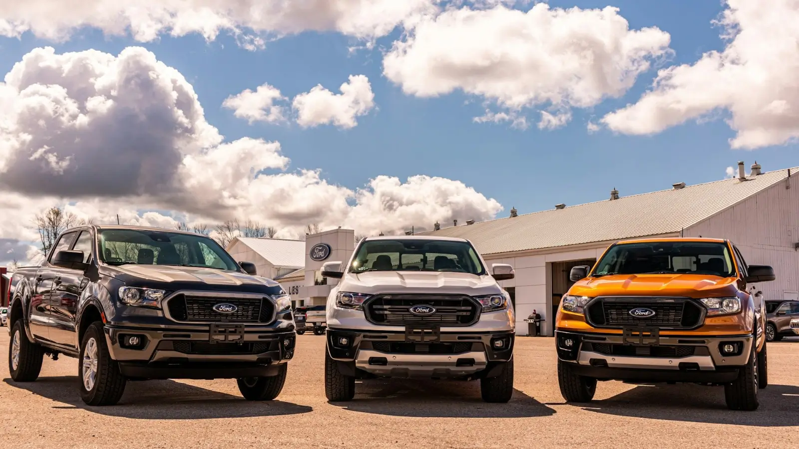 Lineup of Ford electric and hybrid vehicles at a VT Ford dealership