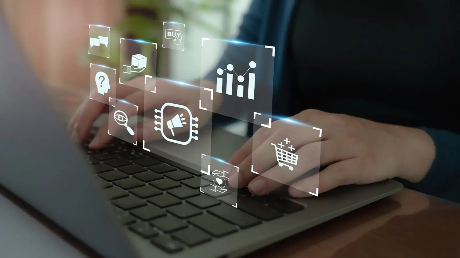 Marketer analyzing Google Ads performance metrics on a laptop screen