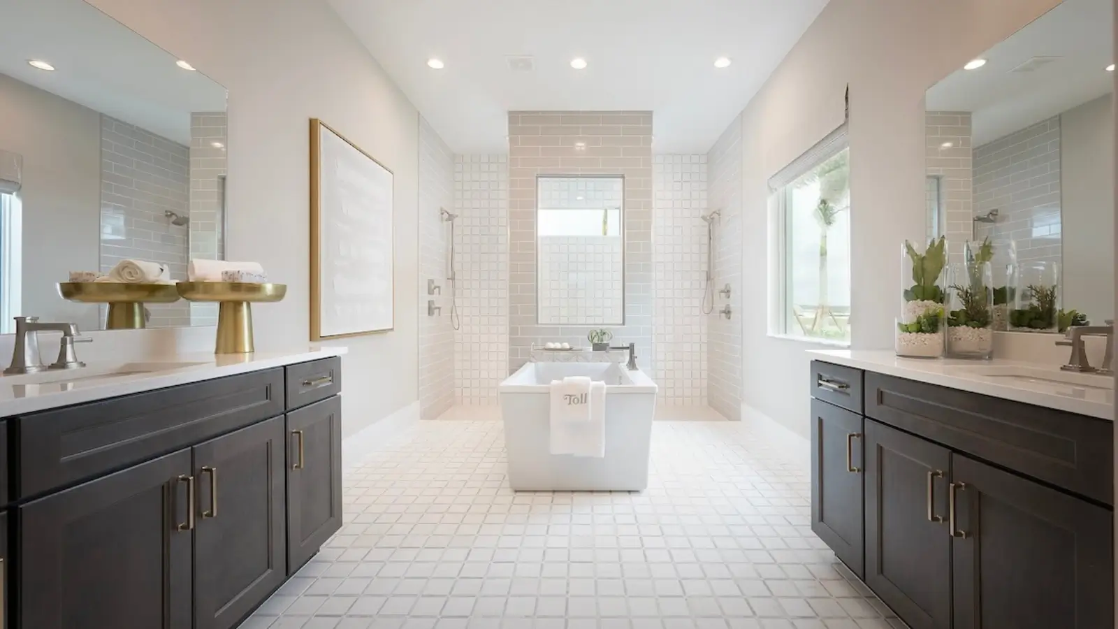 Modern bathroom with walk-in shower and double vanity after renovation