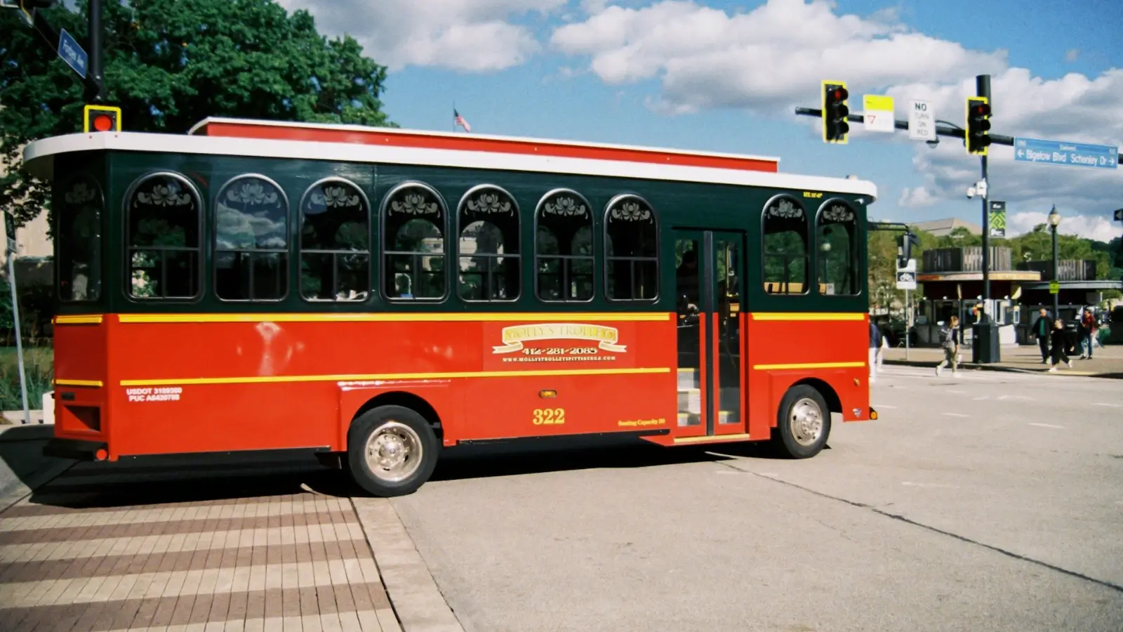 Modern charter bus ready for group travel with passengers boarding