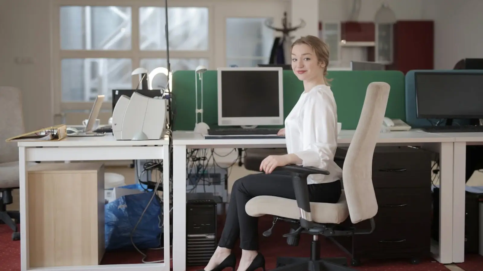 Modern office with ergonomic furniture and smart security systems