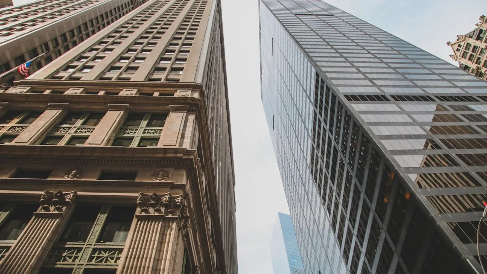 Moving truck parked in front of a suburban Long Island home with NYC skyline in background