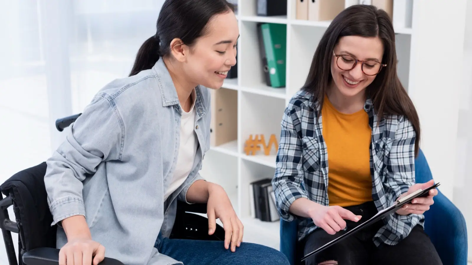 NDIS occupational therapist assisting a client with daily living tasks