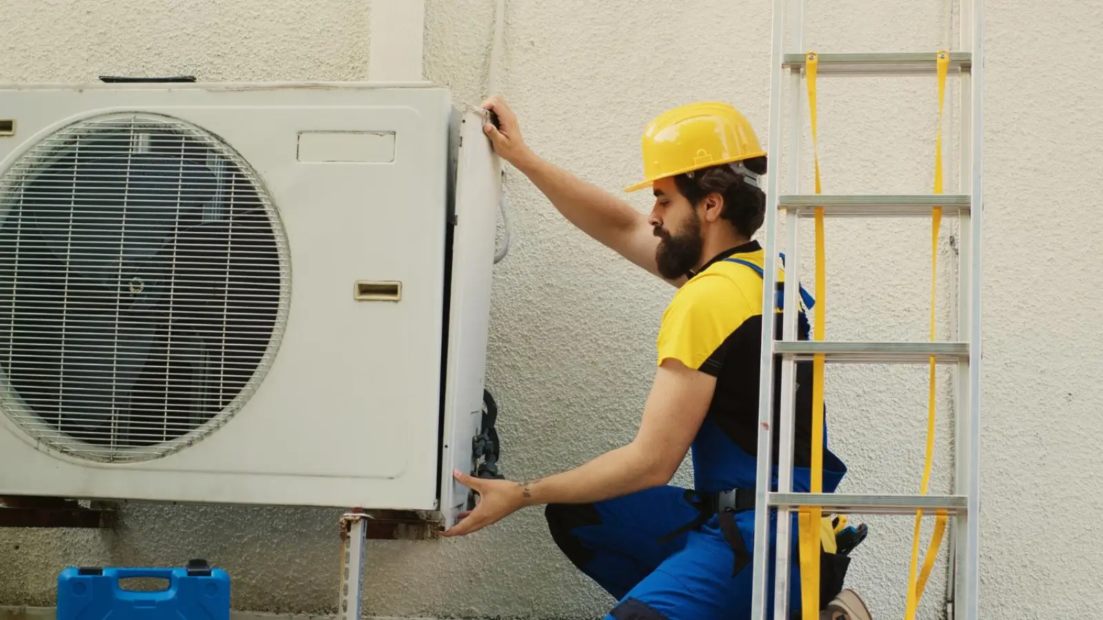 NexAir Home Services technician providing HVAC maintenance at a local home