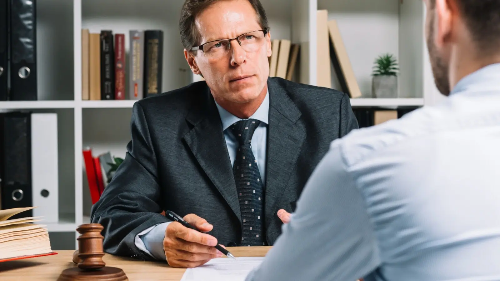 Personal injury lawyer meeting with injured client in a Chicago law office